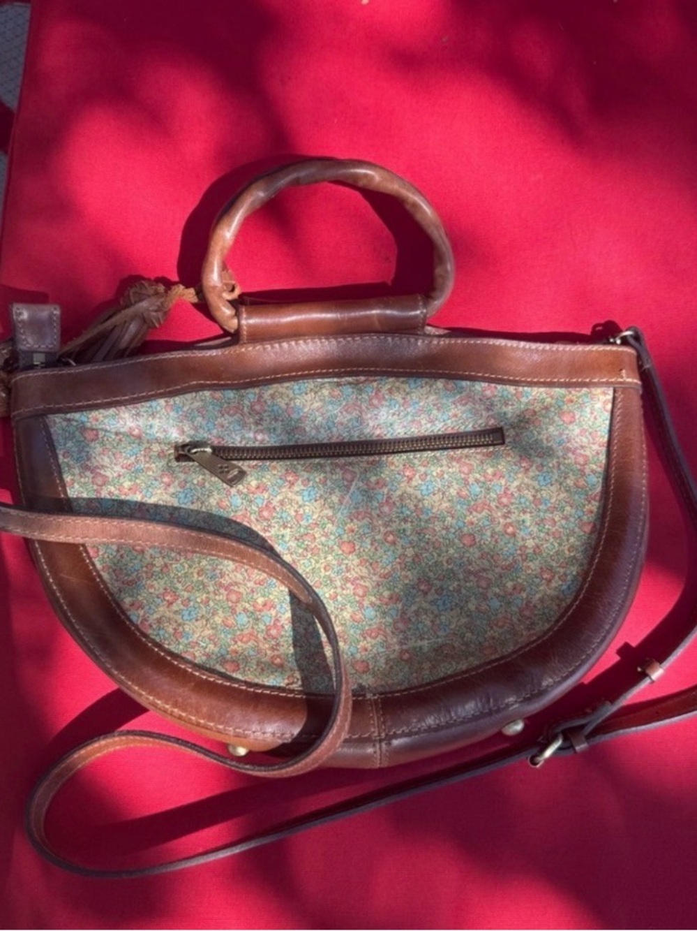 This is a Patricia Nash Ossi Satchel